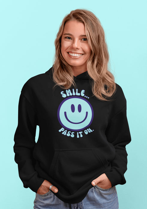 Introducing the ultimate mood booster in fabric form: the "Smile…Pass It On" Happy Face Hoodie! This isn't just any ordinary hoodie; it's a wearable ray of sunshine, guaranteed to spread joy, high-fives, and possibly even spontaneous dance-offs wherever you go.